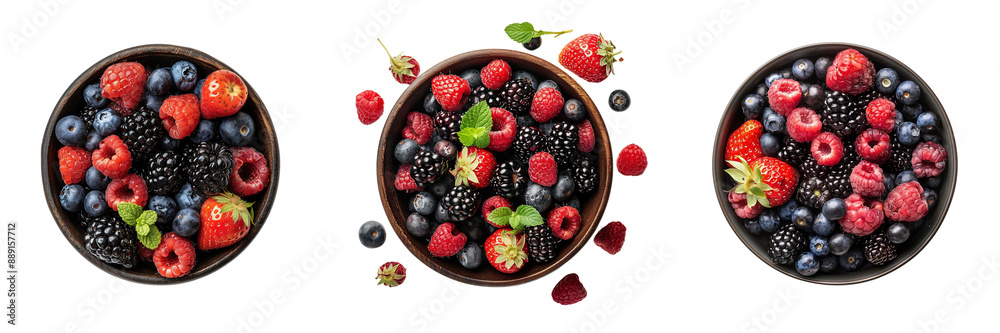 Set of juicy and fresh mixed berries on bowl top view isolated on a transparent background