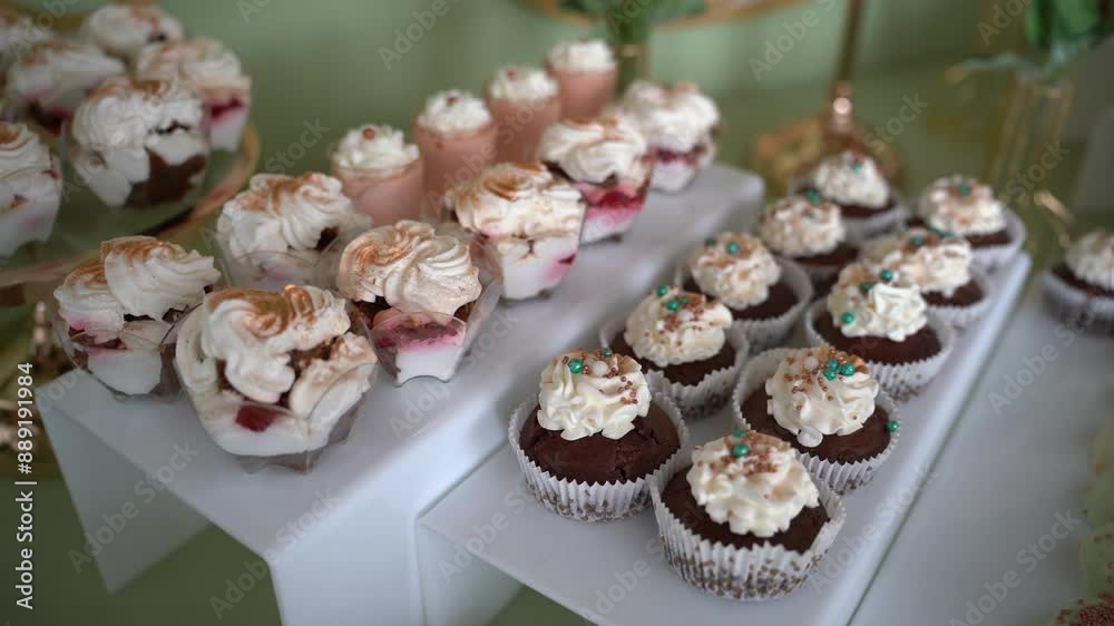 candy bar in an event location. Delicious wedding reception. Candy bar for banquet. Celebration concept. Trendy desserts. Table with sweets, candies. 4k video. candy bar in an event location. Delicious wedding reception. Candy bar for banquet. Celebration concept. Trendy desserts. Table with sweets, candies. 4k video.