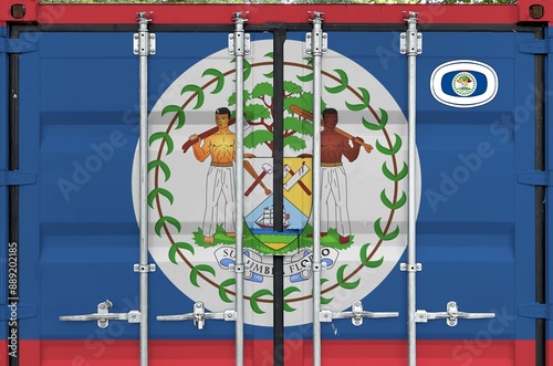 Belize flag depicted on metal doors of shipping cargo container outdoors in docks area close up photo