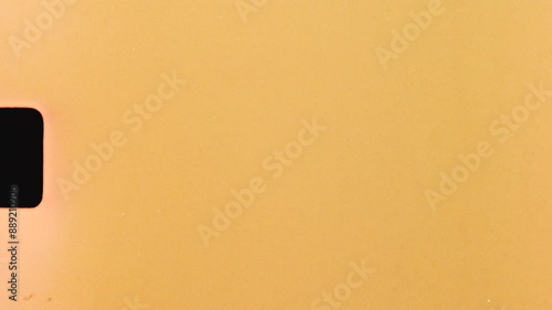 Super 8 vintage film of runner jogging along beach in morning with waves ocean headland coastline in Maroubra Sydney Australia surfing fitness exercise light leaks