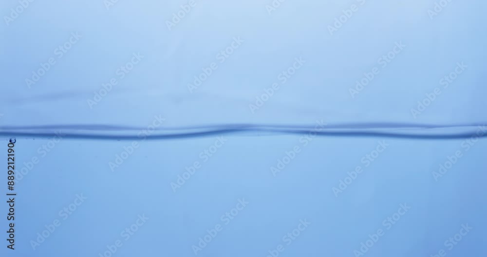 Waves of crystal clear blue waters splashing and sputtering into tiny droplets and bubbles of clean water. Waves of crystal clear blue waters splashing and sputtering into tiny droplets and bubbles of clean water.