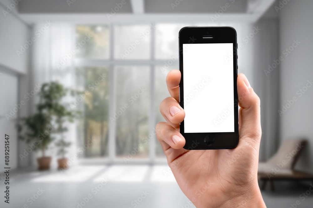 Business man using phone at home Business man using phone at home