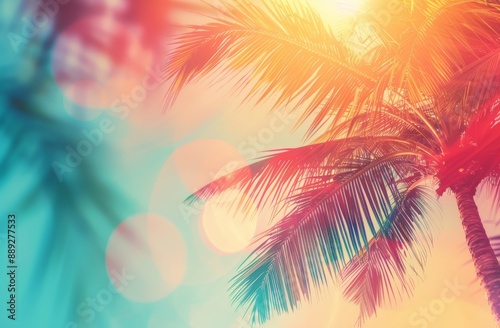 An abstract sunset sky cloud abstract background with tropical palm trees with colorful bokeh sun lights.