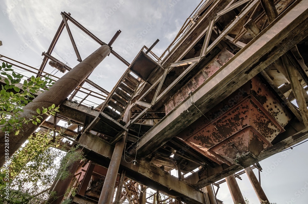 Former Sand Gravel Quarry on the Abandoned Industrial Site. Metal Constructions. Rusted Metal. Wallpaper. Background Former Sand Gravel Quarry on the Abandoned Industrial Site. Metal Constructions. Rusted Metal. Wallpaper. Background