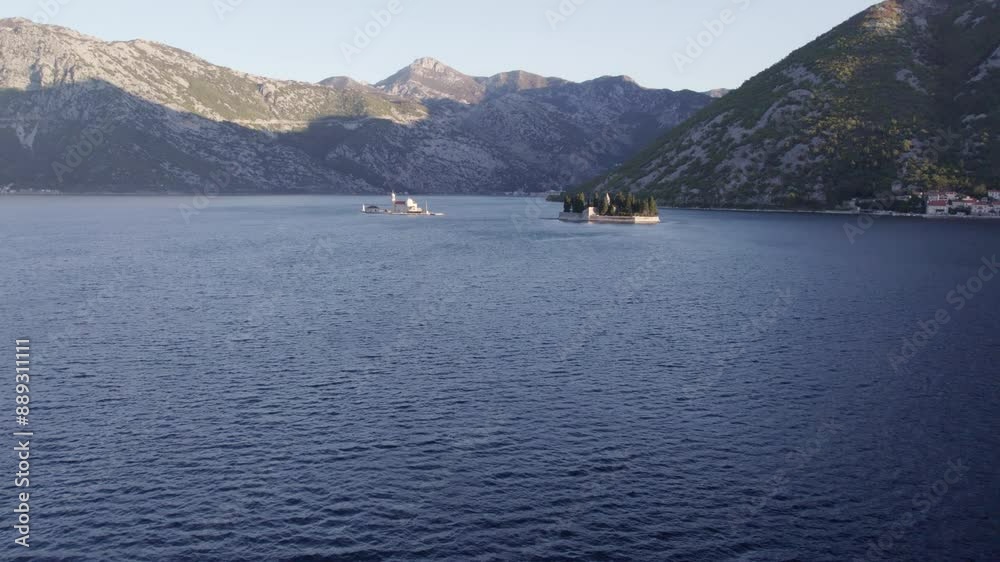 Aerial view of church overlooking Kotor Bay at sunrise, Montenegro. Aerial view of church overlooking Kotor Bay at sunrise, Montenegro.
