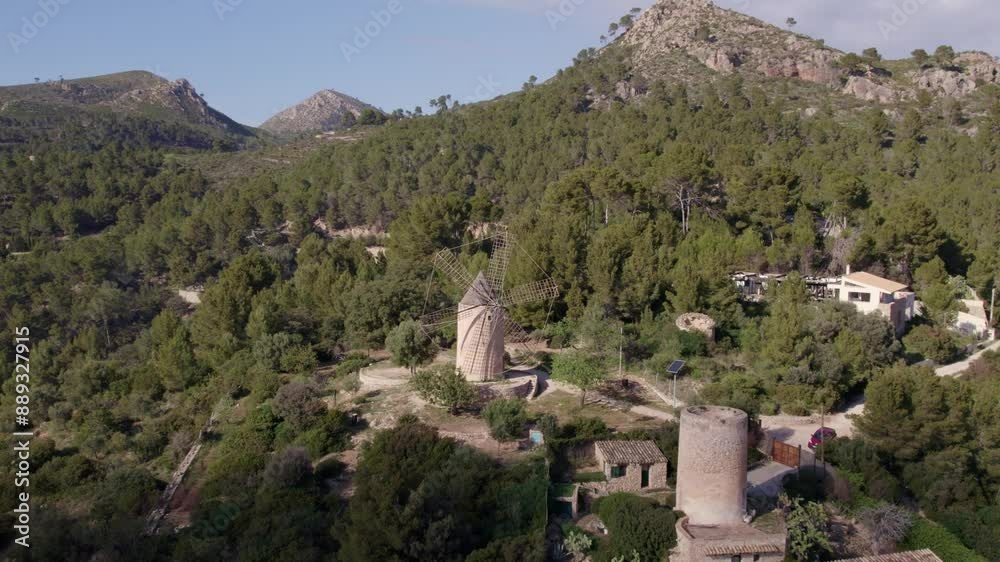 Aerial view of windmill in countryside with Moli de Sa Planeta, Andratx, Mallorca, Spain.