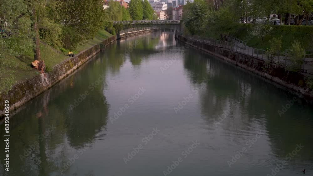 Pan from river to castle in Ljubljana Pan from river to castle in Ljubljana