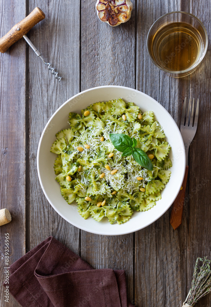 Farfalle pasta with pesto sauce. Healthy eating. Vegetarian food. Farfalle pasta with pesto sauce. Healthy eating. Vegetarian food.