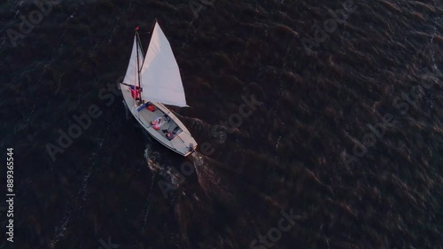 Aerial view of Fluessen lake with sailing boat at sunset, Koudum, Friesland, Netherlands. photo