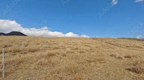 Landscape Kusasenri Observatory in Mount Aso is  Aso Volcano and in this sense is the largest active volcano in Japan, and the largest in the world in Aso Kumamoto Japan - Golden yellow meadow winter photo