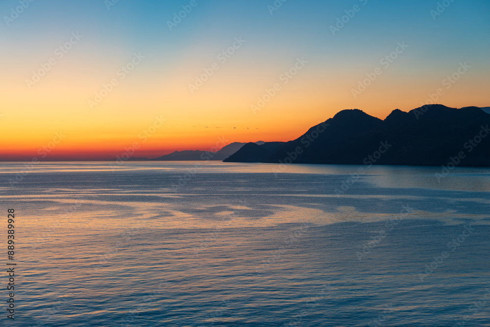 Dobra Voda, Montenegro. View of a beautiful sunset on the Adriatic Sea Dobra Voda, Montenegro. View of a beautiful sunset on the Adriatic Sea