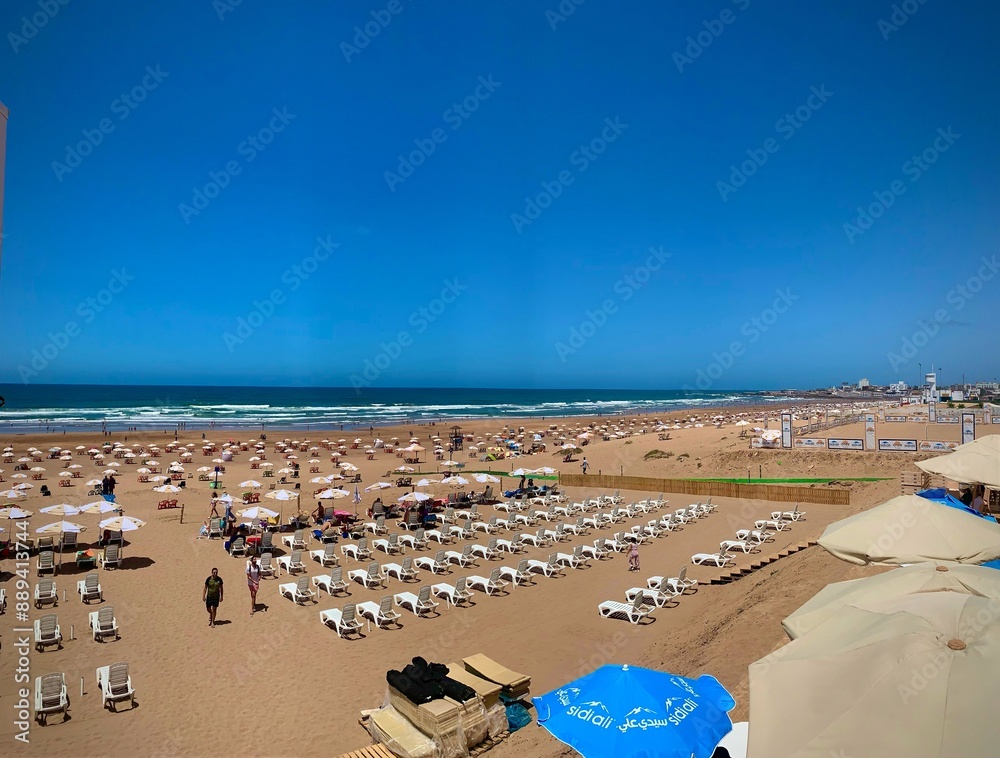 Aerial view of white umbrellas on sandy beach in summer . Tropical colorful landscape. Travel and vacation background. Top down view from drone. Tropical pattern. Concept
Aerial view of white umbrellas on sandy beach in summer . Tropical colorful landscape. Travel and vacation background. Top down view from drone. Tropical pattern. Concept