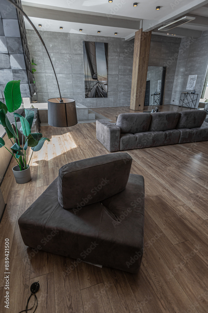 stylish minimalistic restrained modern interior of the apartment, a spacious room with a swimming pool, large panoramic windows overlooking the mountains. without people in the daytime stylish minimalistic restrained modern interior of the apartment, a spacious room with a swimming pool, large panoramic windows overlooking the mountains. without people in the daytime