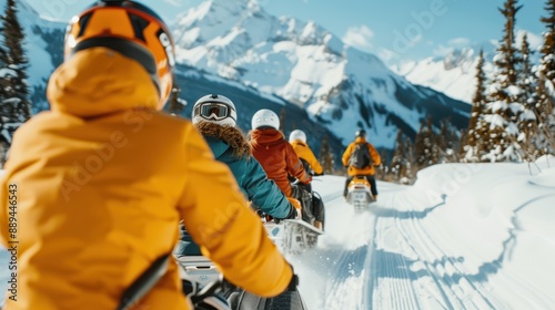 Wallpaper Mural A group of people enjoying a thrilling snowmobile ride through a picturesque snowy mountain landscape, showcasing the vibrant outdoor winter activity in full action. Torontodigital.ca