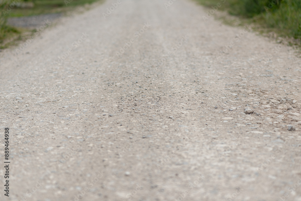 empty rocky road in countryside, summer day, background, copy space empty rocky road in countryside, summer day, background, copy space