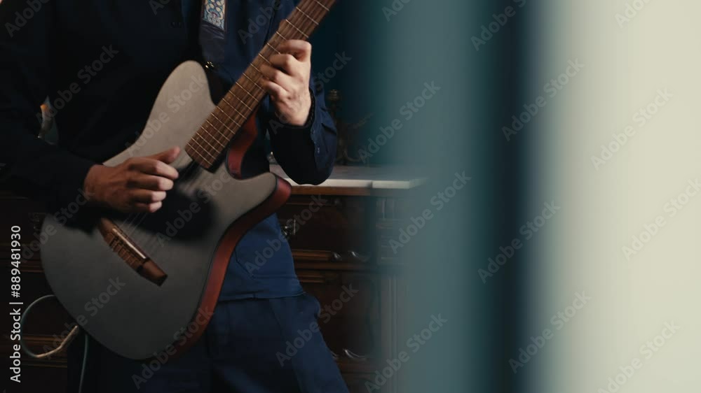 Guitar player, guitarist is performing live on stage with an electric guitar in a concert setting, music playing, live concert show, close up macro of guitar.