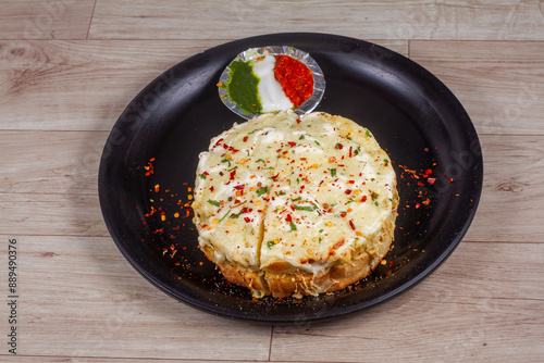 round cheese burst pizza sandwich with three color sauce