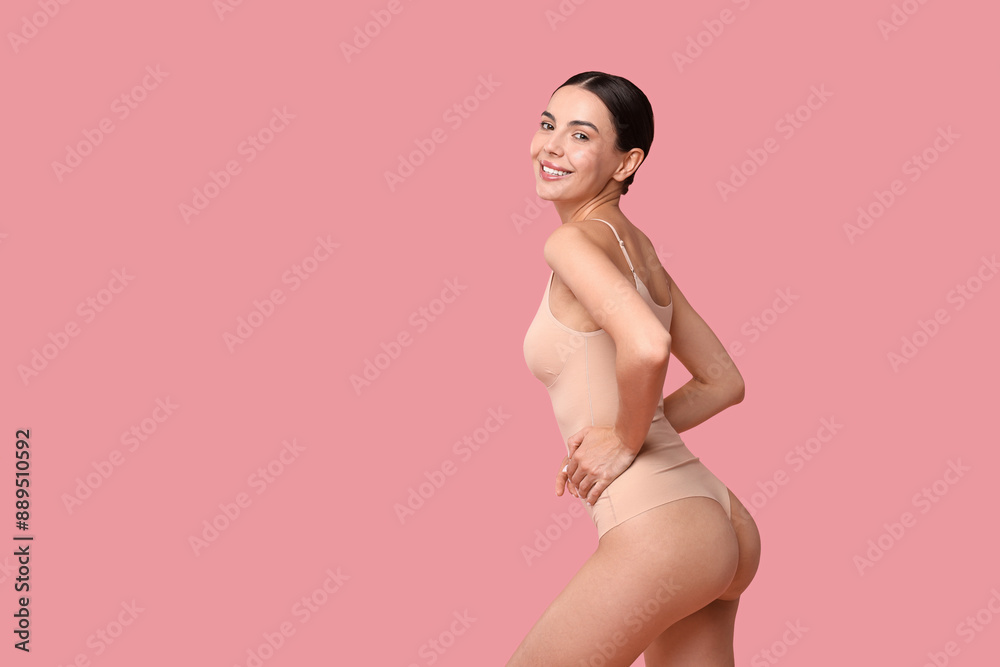 Smiling woman with perfect skin on pink background, space for text. Body care Smiling woman with perfect skin on pink background, space for text. Body care