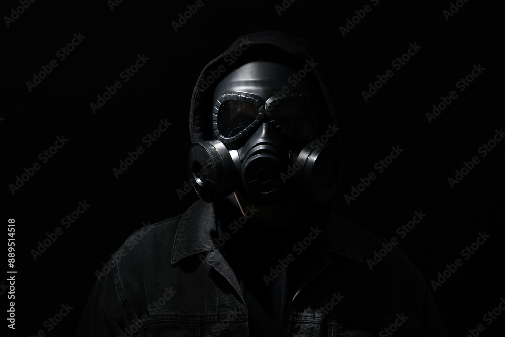 Man in gas mask on black background Man in gas mask on black background