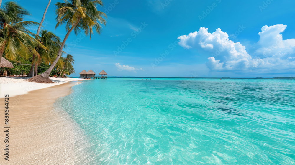 Naklejka premium Tropical Beach Paradise with Clear Water, Palms, and Overwater Bungalows Under Clear Blue Sky