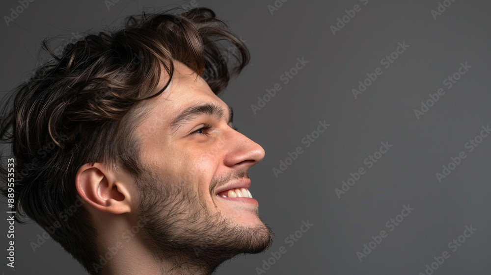 portrait of a young handsome male. - side view. portrait of a young handsome male. - side view.