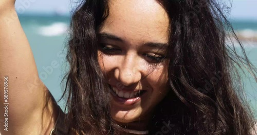 Close-up teenager smiling by the sea