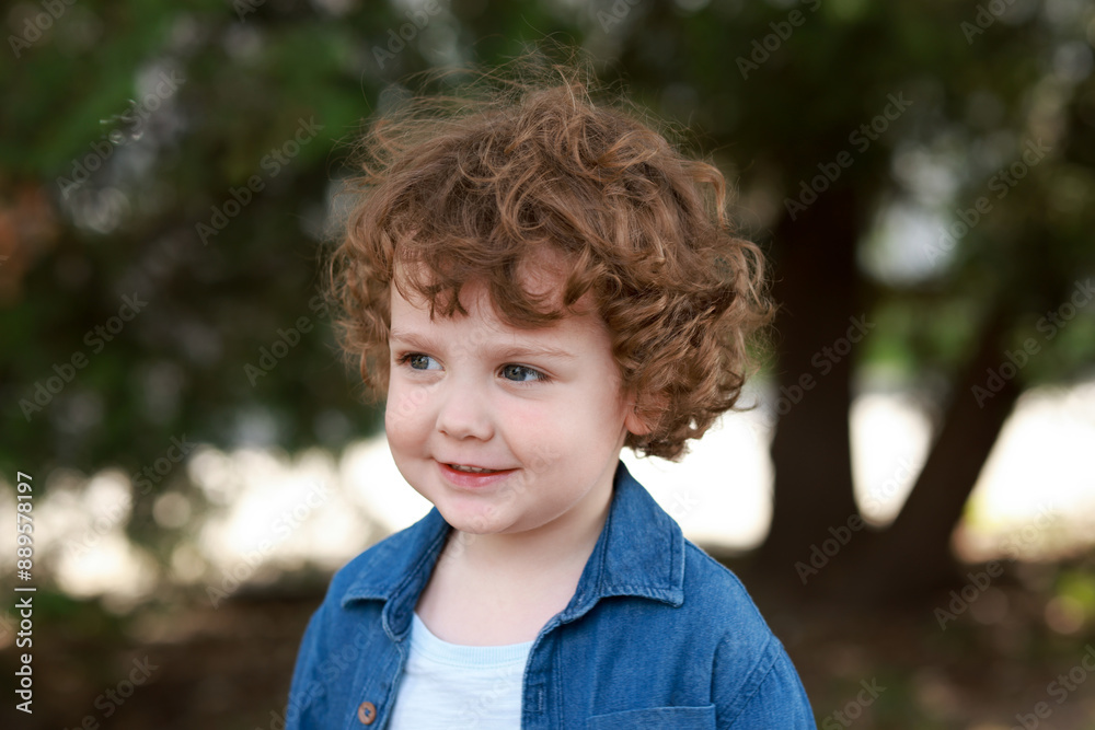 Portrait of little boy outdoors. Cute child Portrait of little boy outdoors. Cute child