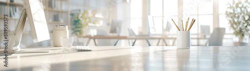 Modern, bright office space with minimalist decor, featuring a clean desk setup, plants, and ample natural light.