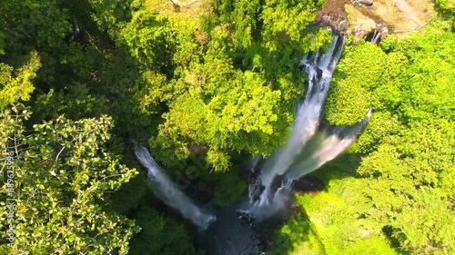 drone shot of waterfall in the jungle