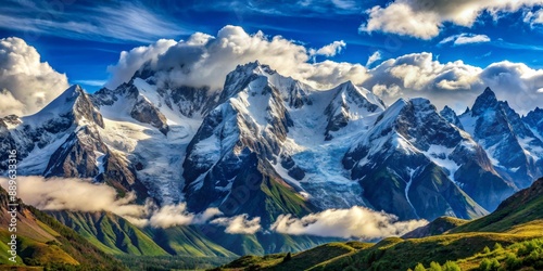 Majestic Mountain Peaks Piercing Through Clouds, Landscape Photography, Snow-capped Mountains, Blue Sky, Cloud Formations, Mountain Range, Nature Photography photo