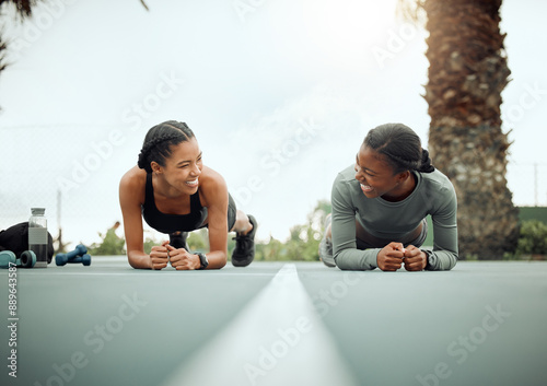 Outdoor, workout and women with plank for morning exercise, balance or core fitness routine. Court, athlete and African friends for endurance challenge, physical activity or muscle gain in park