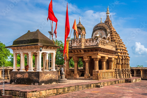 Chausath Yogini or 64 Yoginis temple is a religious centre located atop a hill built of granite and sandstone and depicts architectural precision of that era constructed by the Kalchuri dynasty. photo