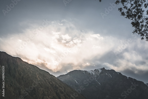 Atmospheric sunset in the Tien Shan mountains in the Pamirs, landscape panorama for the background