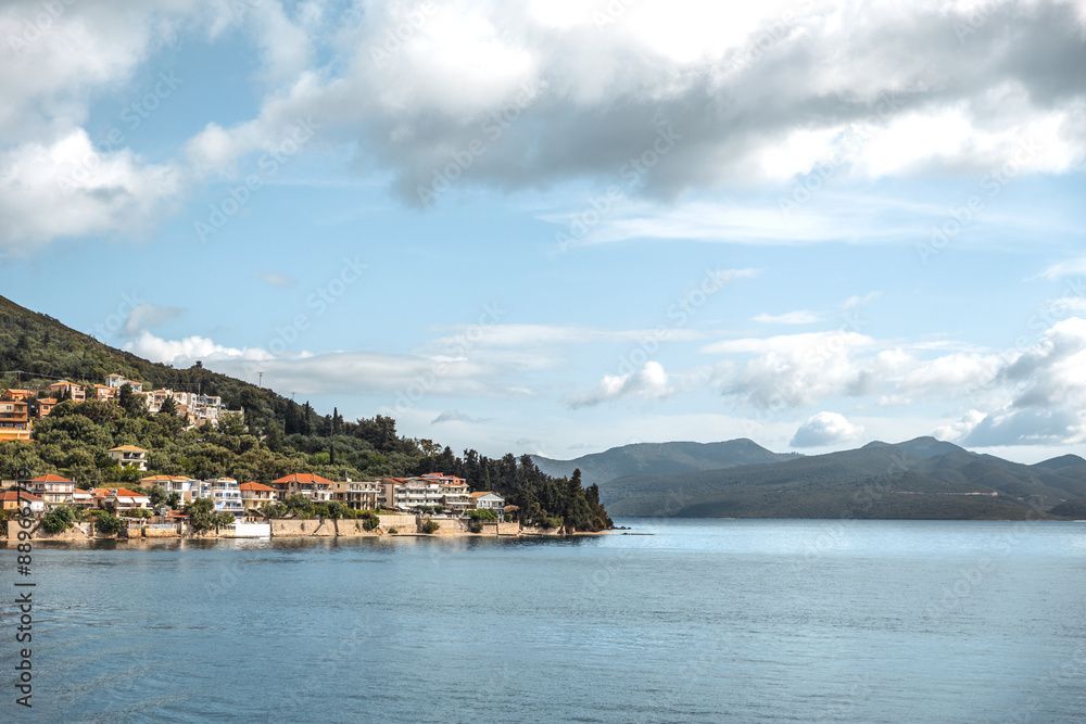 Cruise from Nidri port in Lefkada or Lefkas Greek island, Ionian Sea near Preveza. Summer vacation on boat, cloudy sky Cruise from Nidri port in Lefkada or Lefkas Greek island, Ionian Sea near Preveza. Summer vacation on boat, cloudy sky