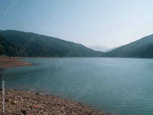 Beautiful green mountains with cloudy sky background. Summer vacation. Mountain landscape. photo