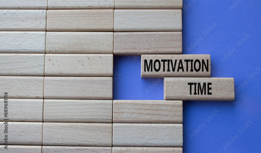 Motivation Time symbol. Concept word Motivation Time on wooden blocks. Beautiful purple background. Business and Motivation Time concept. Copy space