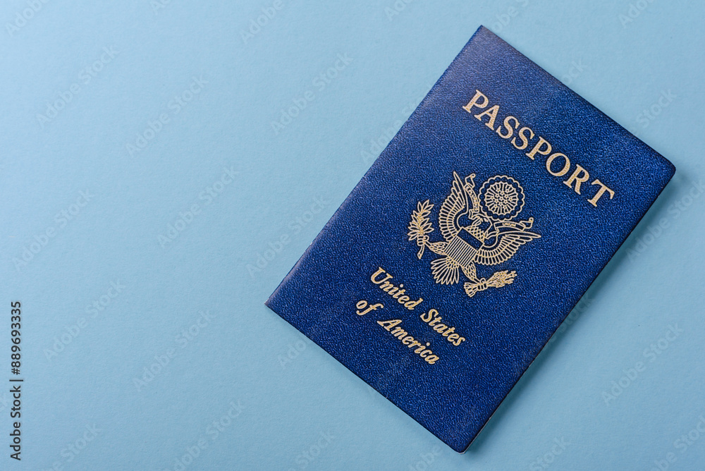 United states of america passport on a blue background United states of america passport on a blue background