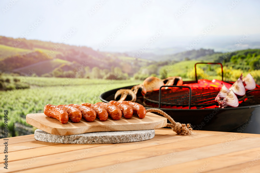 Φωτογραφία Wooden garden table and grilled sausages and vegetables in  summer time concept and copy space for food and products