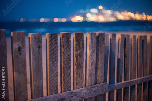 Wooden Fence on El Rinconcillo Beach with Algeciras Seaport in Background