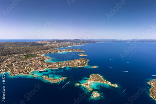 Panoramic aerial view of the stunning coastline of Sithonia, Diaporos island, Greece, with turquoise bays, lush greenery, and scattered islands in the deep blue sea, capturing the breathtaking beauty