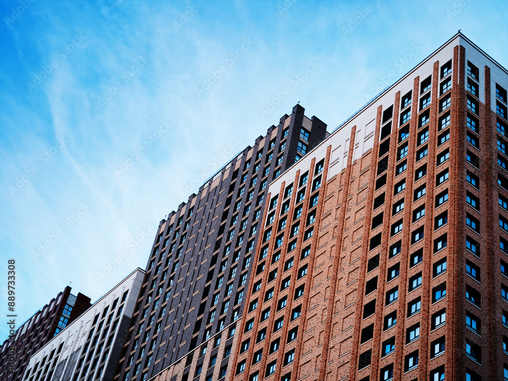 Obraz premium Diagonal many-storied buildings architecture backdrop