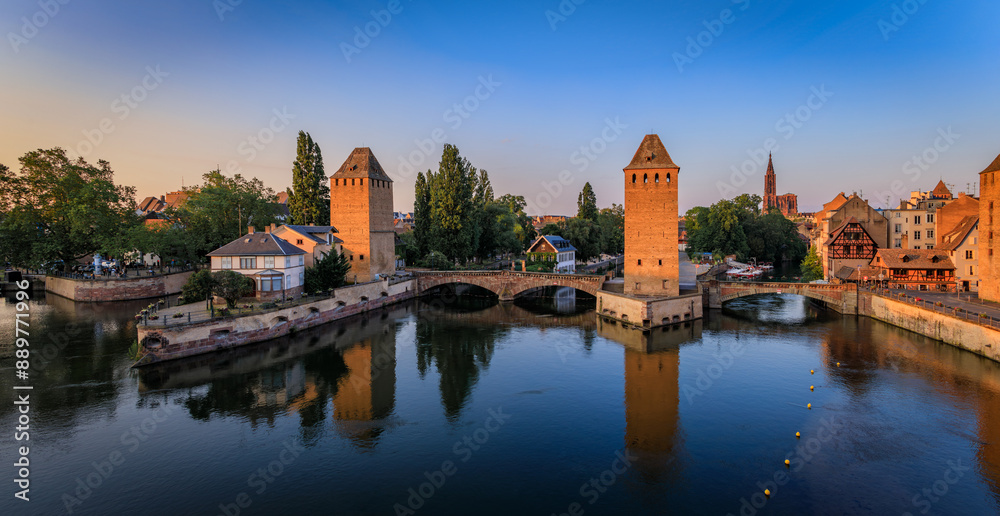 Naklejka premium Ponts Couverts Covered Bridges, Petite France canals, Strasbourg, France, sunset