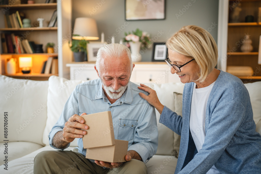 Mature wife surprised her senior husband whit gift while he read book Mature wife surprised her senior husband whit gift while he read book