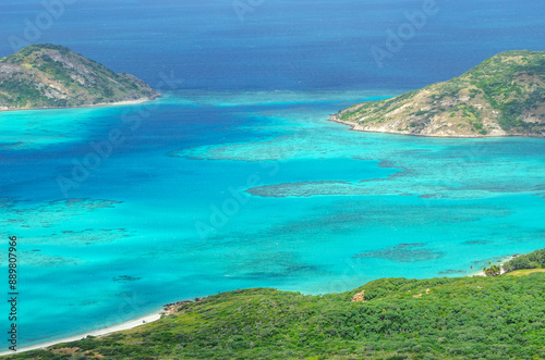 Picturesque tropical golden sandy Mangrove Beach with turquoise water on Blue Lagoon bay, Lizard Island, Australia. Lizard Island  is situated on Great Barrier Reef in north-east part of Queensland