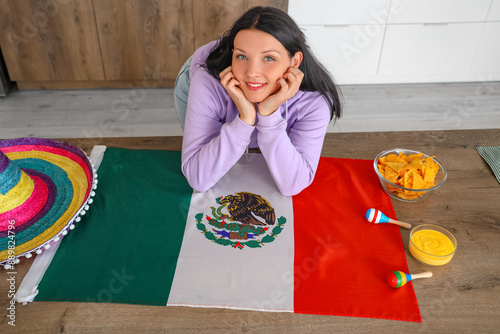 Young woman with Mexican fl...