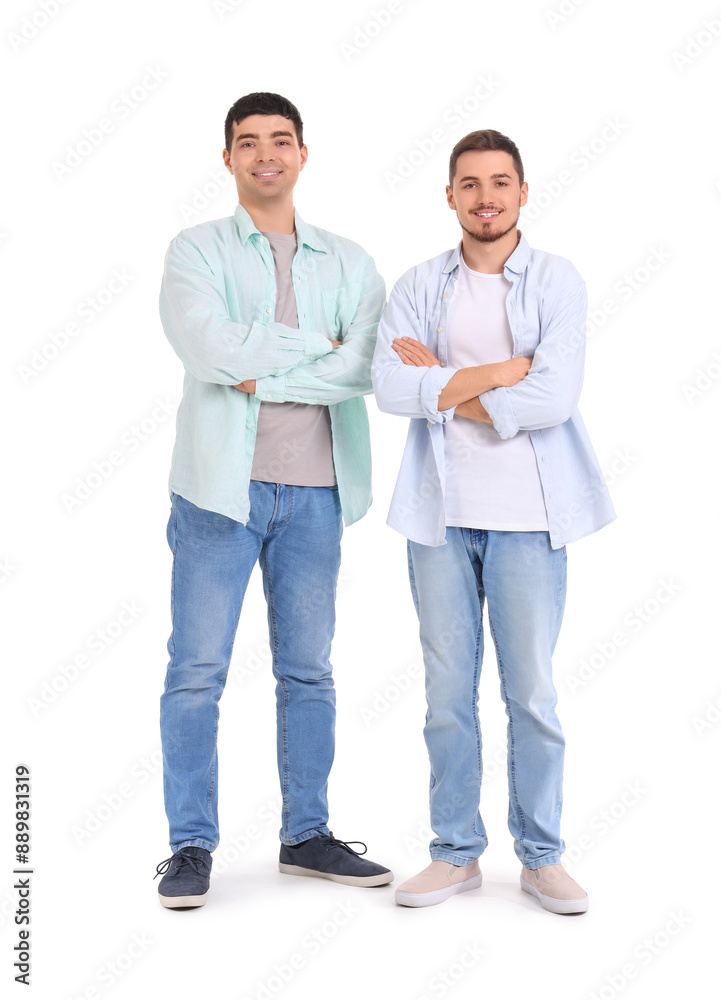 Handsome young brothers on white background Handsome young brothers on white background