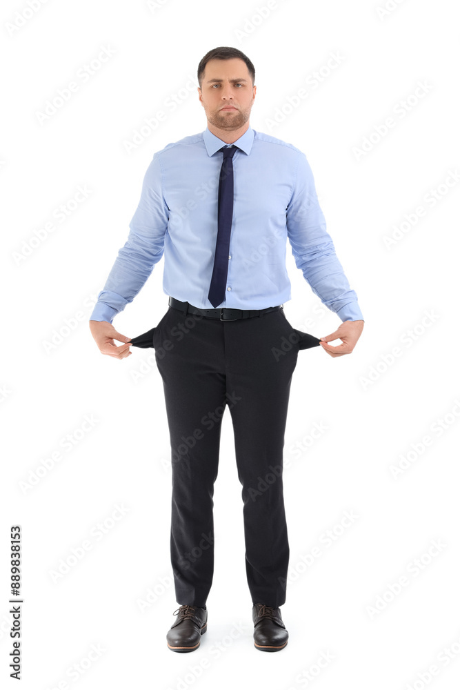 Sad businessman with empty pockets on white background. Bankruptcy concept Sad businessman with empty pockets on white background. Bankruptcy concept