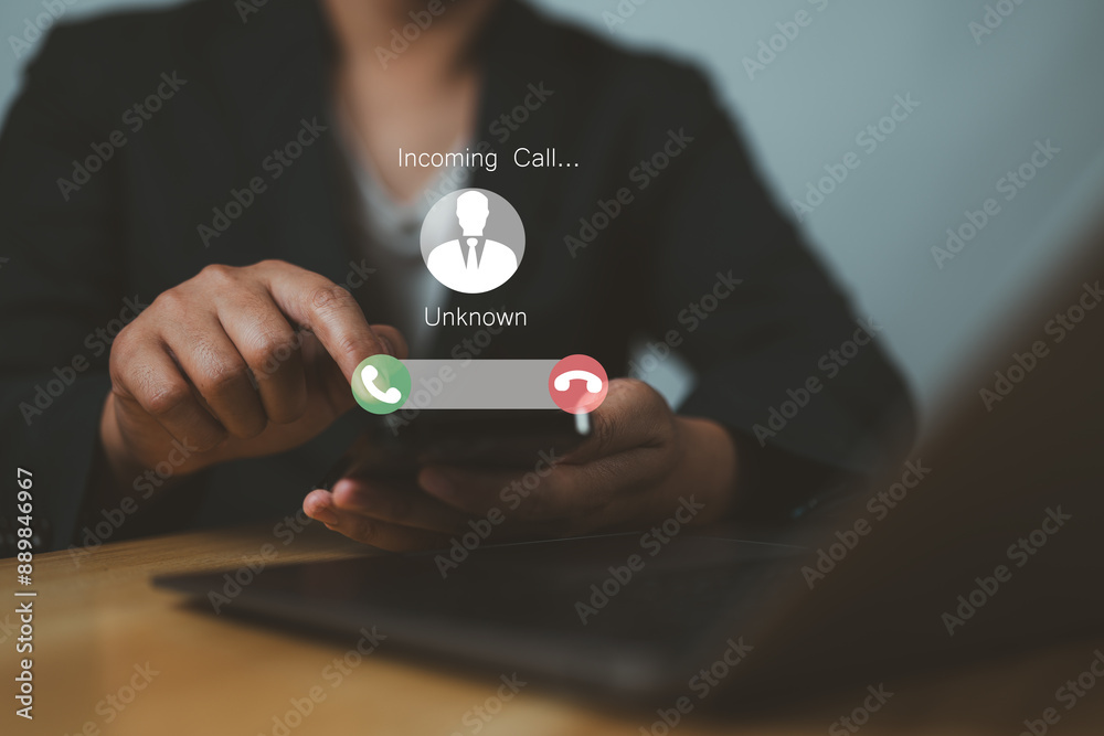 © Nirusmee - Man answering to incoming from an unknown caller. Phone call from unknown number. Calling Incoming Communication Connect Concept.