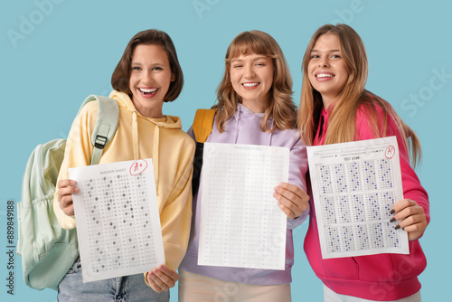 Happy female students with ...