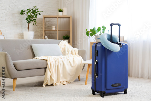 Blue travel suitcase with a...